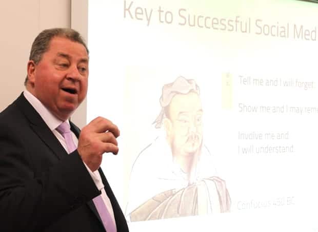 A guest speaker presenting on the keys to successful social media marketing at a Small Business Festival workshop